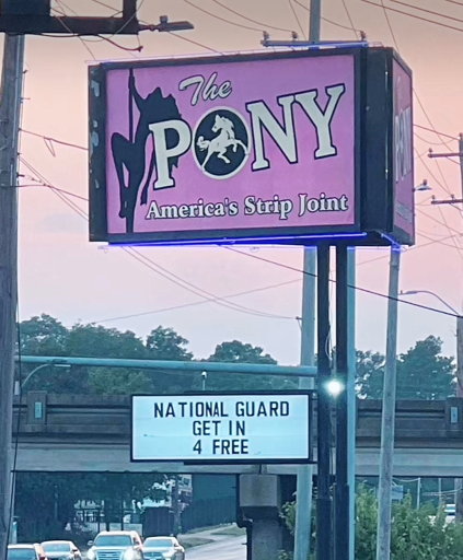 A sign outside of a strip club in Memphis, Tennessee saying National Guard gets in for free